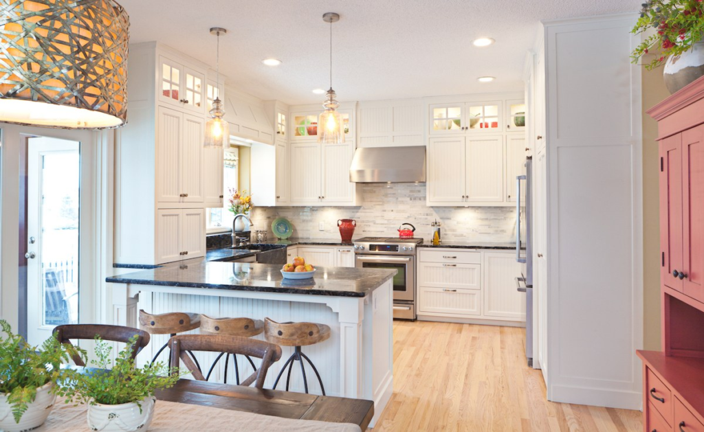 Best Home Improvement Ideas to Increase Your Home Value featuring a modern renovated home with upgraded kitchen, stylish bathroom, fresh landscaping, smart home technology, and energy-efficient improvements.